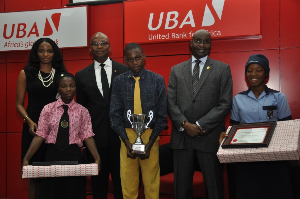 l-r: Managing Director, UBA Foundation, Ms Ijeoma Aso; 1st Runner-Up, Miss Toluwalase Adeagbo of Sharon Rose Schools College, Saki; Deputy Managing Director, UBA Plc, Mr. Kennedy Uzoka; 1ST Prize Winner, Master Ezenwa Joseph Okonkwo, student of Ambol Comprehensive High School, Akesan-Igando, Lagos (Middle); President, Institute of Chartered Accountant of Nigeria(ICAN), Alhaji Alkali Mohammed; and 2nd Runner Up, Miss Korie Ijeoma Jenniffer of Air Force Secondary School, Port Harcourt, during the grand finale ceremony of UBA Foundation National Essay Competition for Secondary School Students held at UBA House, in Lagos on Monday