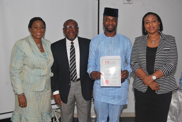 L-R: Managing Director of NECCI Ltd, Mrs. Nkechi Ali-Balogun , President PRCAN, John Ehiguese, Red Media Africa of Newly Inducted agency , Mr Adebola Williams and Honourable Treasurer of PRCAN, Mrs. Mojisola Saka,  at the  concluded 2015 PRCAN Annual General Meeting /Induction of New member held in Lagos recently