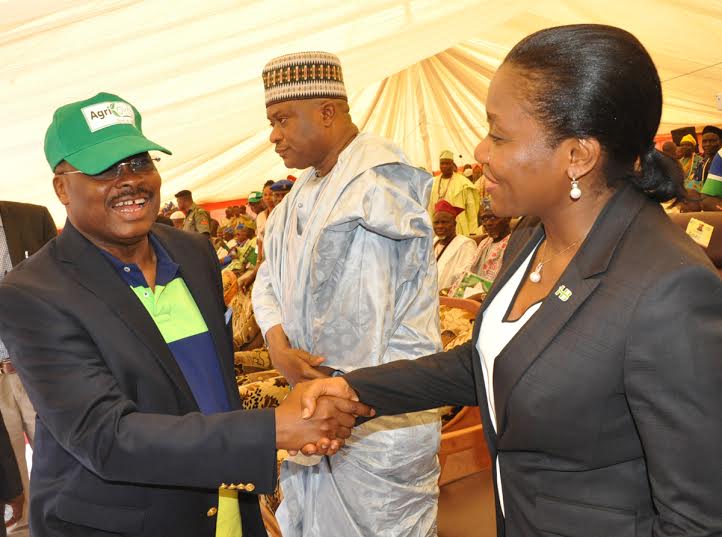 From Left to Right: Oyo State Governor, His Excellency, Senator Abiola Ajimobi in a warm handshake with Mrs. Mary Akpobome, Heritage Bank’s Executive Director, Lagos, South West and Corporate Banking; at the launching of Oyo State Agricultural Initiative, OYSAI, supported by the Bank, at Paago Village, Iseyin Local Government Area of the State on Tuesday. In the background is Shuaibu Bello, CEO, Inter Products Link Limited, an agro-allied investor invited to the occasion.