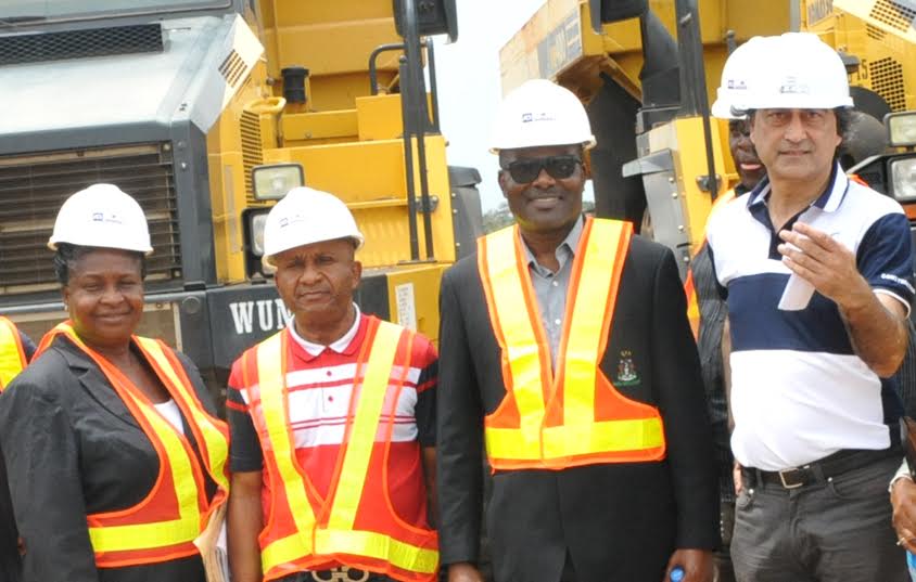 L-R: Engr. Mrs Osarieme Osakue, Federal Ministry of Power, Works and Housing; Engr. Godwin Eke, Federal Controller of Works, Lagos; Chief Mike Ajayi, GM, Western Port;  and  Ashif Juma, MD/CEO, AG-Dangote Construction company  during inspection  of AG – Dangote concrete road construction at Itori – Ibese Road, Ogun State by Nigeria Port Authority and Federal Ministry of Works